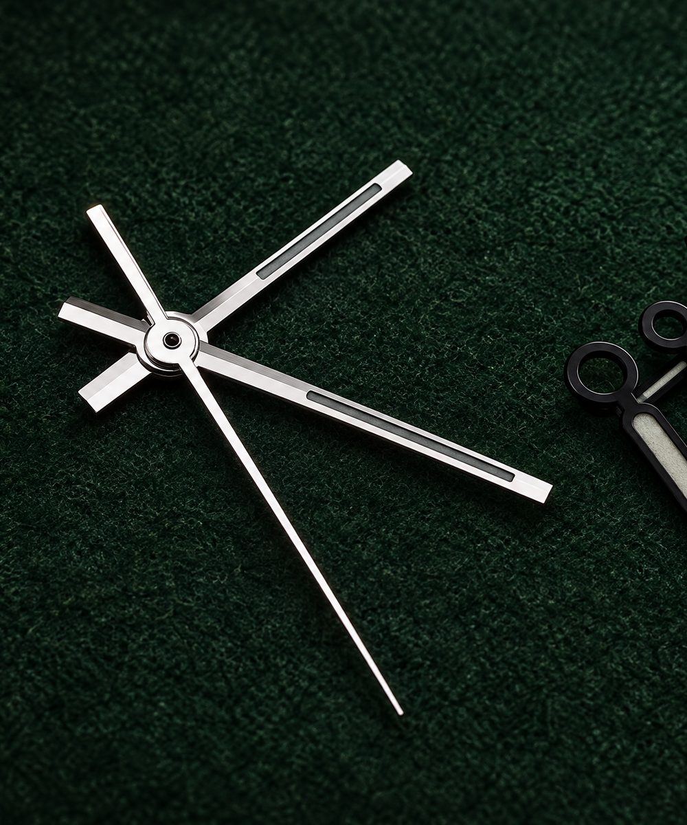 Illustrative image of loose polished silver baton hands on a bench mat
